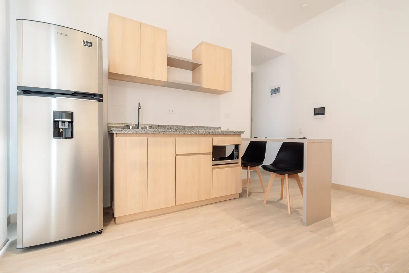 Zona de cocina y comedor del apartaestudio Especial